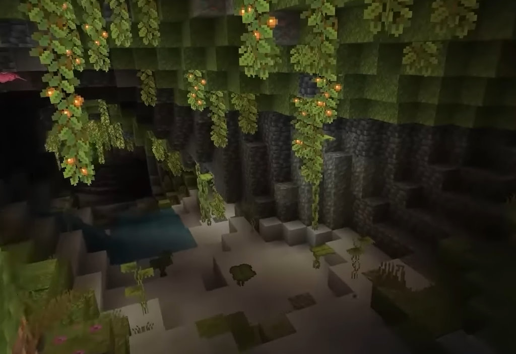 Игровой кадр Minecraft: зелёная пещера, лианы и подземная вода